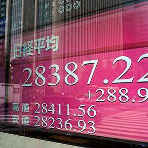 An electronic quotation board displays share prices in the morning trading on the Tokyo Stock Exchange in Tokyo on May 21, 2021. (Photo by Kazuhiro NOGI / AFP) (Photo by KAZUHIRO NOGI/AFP via Getty Images)